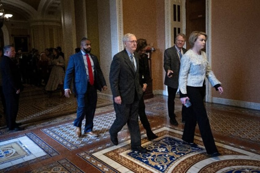 US Senate Minority Leader Senator Mitch McConnell, Republican of Kentucky, walks to his of