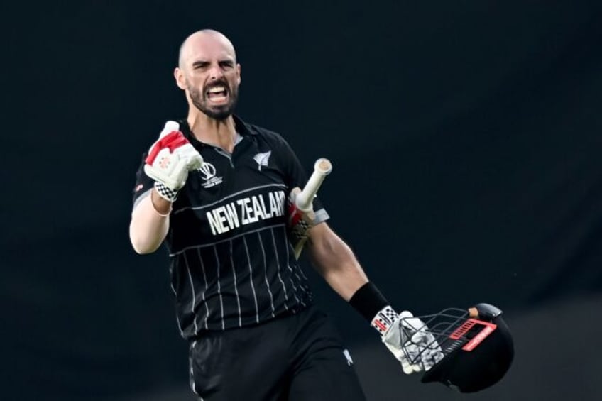 mitchell century as new zealand make 273 against india in world cup