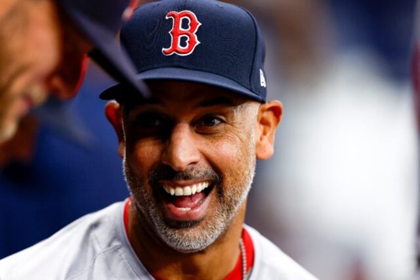 Boston Red Sox manager Alex Cora has agreed on a three-year contract extension with the ML