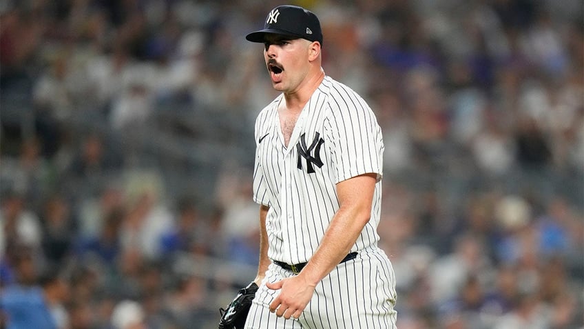 mlb scores carlos rodon gets first yankees victory in win over mets rangers clobber astros