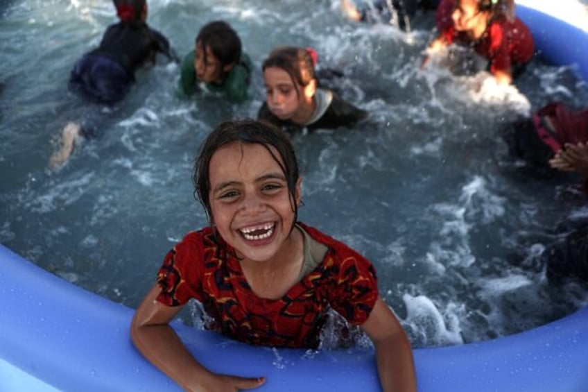 The mobile swimming pools were brought to the camp for displaced people in northern Syria