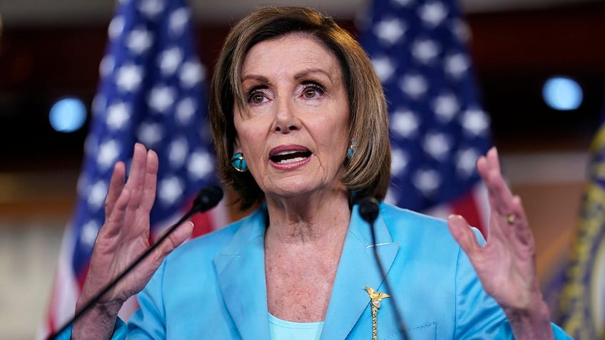 House Speaker Nancy Pelosi, D-Calif., talks to reporters just after the Supreme Court dismissed a challenge to the Obama-era health care law at the Capitol in Washington, Thursday, June 17, 2021. Pelosi has said repeatedly that she will not bring the bipartisan infrastructure bill up for a vote until the Senate passes a massive budget reconciliation package. (AP Photo/J. Scott Applewhite)