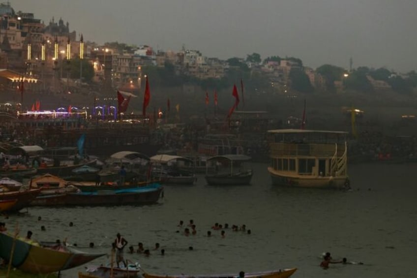 Motor boats ferrying people on the Ganges river at Varanasi