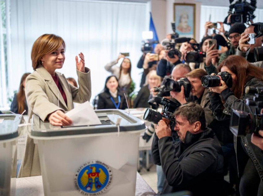 Moldova's President Maia Sandu prepares to cast her vote, in Chisinau, Moldova, Sunda