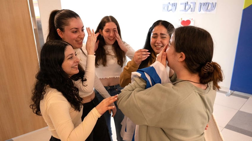 Agam Berger reunites with Liri Albag, Naama Levy, Naama Levy, Daniela Gilboa and Karina Ariev after 482 days in Hamas captivity.