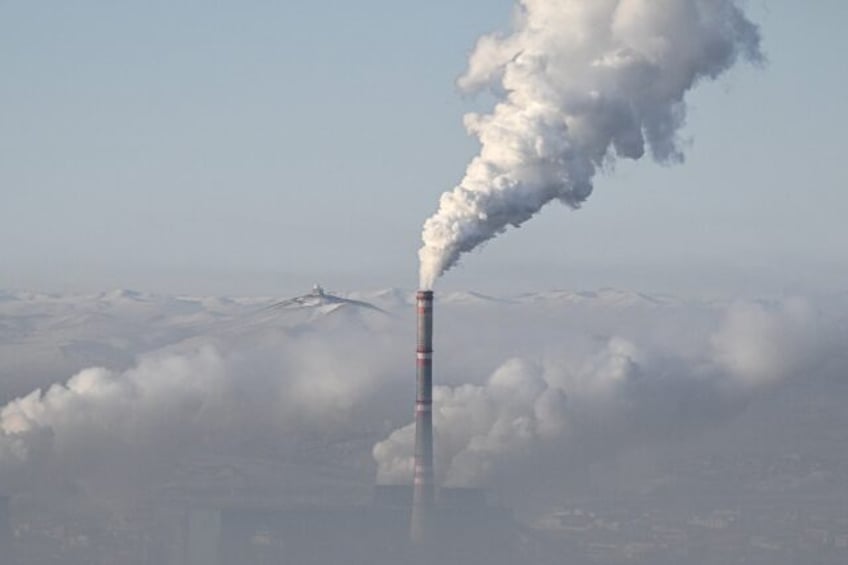 Located in a basin surrounded by mountains, Ulaanbaatar traps smoke and fumes from both co