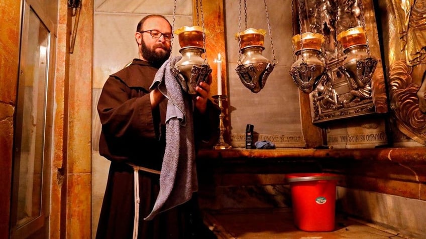 monks struggle to keep jerusalem churches open for christians amid israel hamas conflict