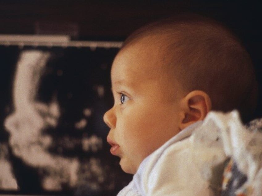 Baby With Sonogram (Photo by © Jacques Pavlovsky/Sygma/CORBIS/Sygma via Getty Images)