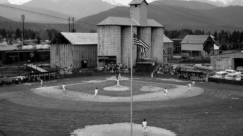 A baseball field next to a railyard in Libby, Montana, where asbestos-tainted vermiculite was stored after being mined from a nearby mountain.