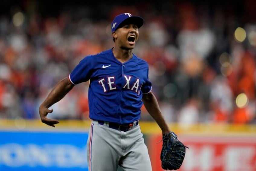 montgomery shuts out astros taveras homers as rangers get 2 0 win in game 1 of alcs