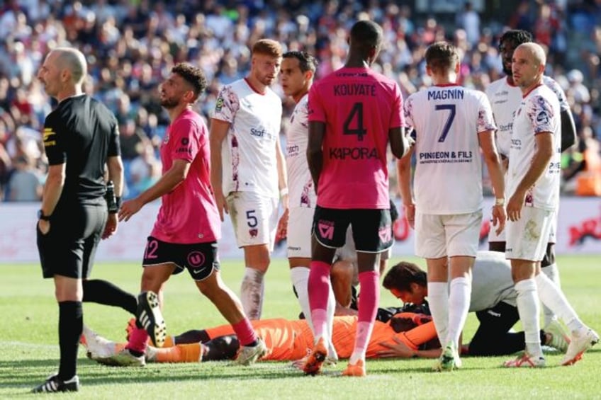 montpellier game in ligue 1 abandoned after firecracker thrown at goalkeeper