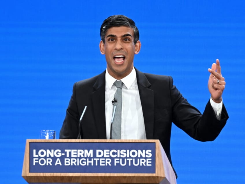 MANCHESTER, ENGLAND - OCTOBER 04: UK Prime Minister Rishi Sunak delivers his speech during the final day of the Conservative Party Conference on on October 04, 2023 in Manchester, England. Rishi Sunak delivers his first speech as Conservative Party Leader to members and delegates today. He is expected to announce …