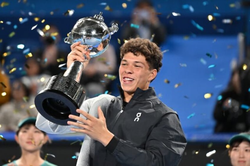 more subdued shelton enjoys first atp title