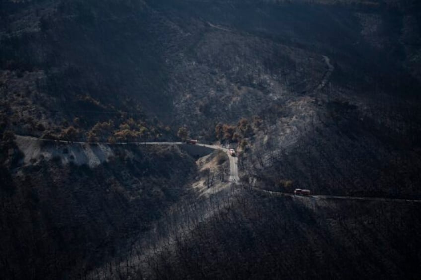 more than 600 firefighters backed by water dropping aircraft struggle to control wildfires in greece