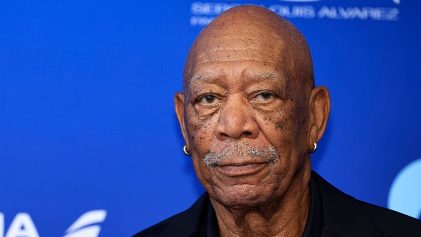 Morgan Freeman looks unamused/stoic on the carpet