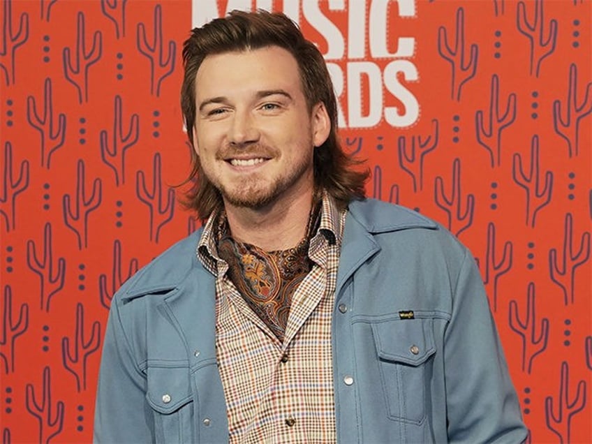 In this June 5, 2019, file photo, Morgan Wallen arrives at the CMT Music Awards in Nashvil