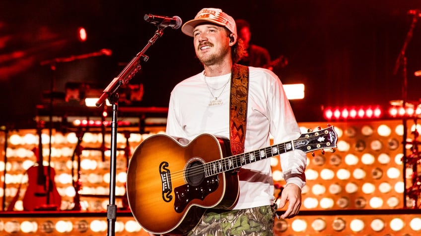 Morgan Wallen performs on stage