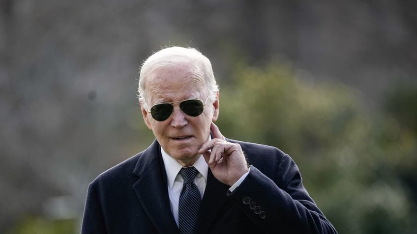 WASHINGTON, DC - DECEMBER 19: U.S. President Joe Biden listens to a question shouted from the press as he arrives at the White House December 19, 2023 in Washington, DC. President Biden spent the weekend in Wilmington, Delaware. (Photo by Drew Angerer/Getty Images)