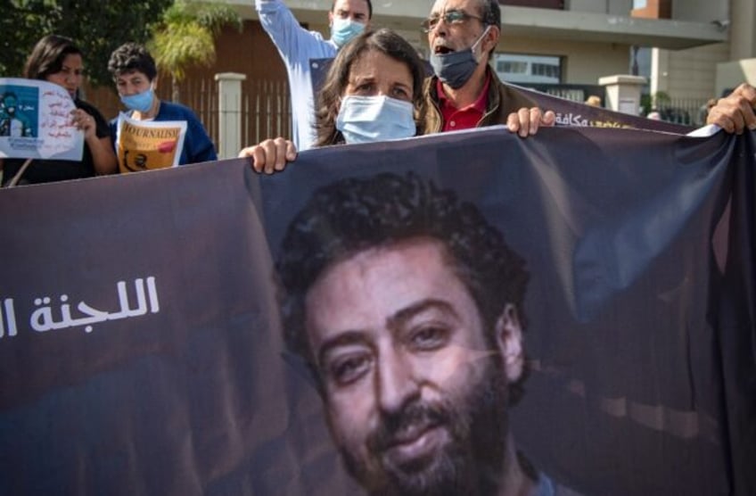 moroccan court keeps two journalists behind bars