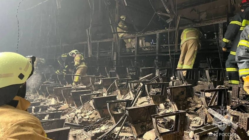 Firefighters in the aftermath of Moscow attack