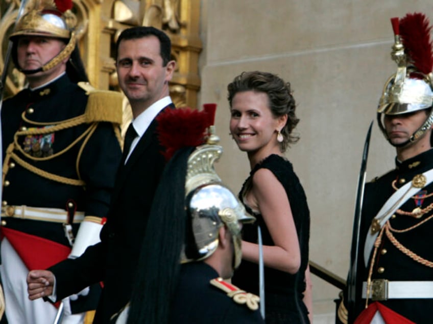 FILE - In this July 13, 2008 file photo, Syrian President Bashar Assad and his wife Asma