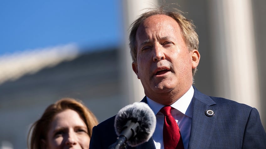 Ken Paxton in front of Supreme Court