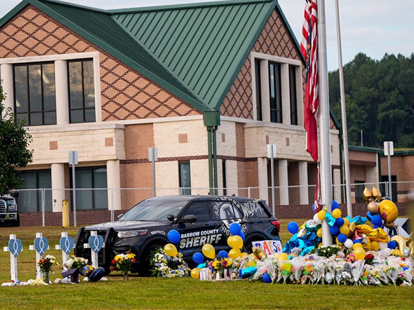 A memorial is seen at Apalachee High School after the Wednesday school shooting, Saturday,