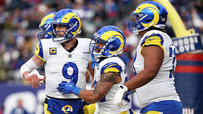 Matthew Stafford and Kyren Williams celebrate