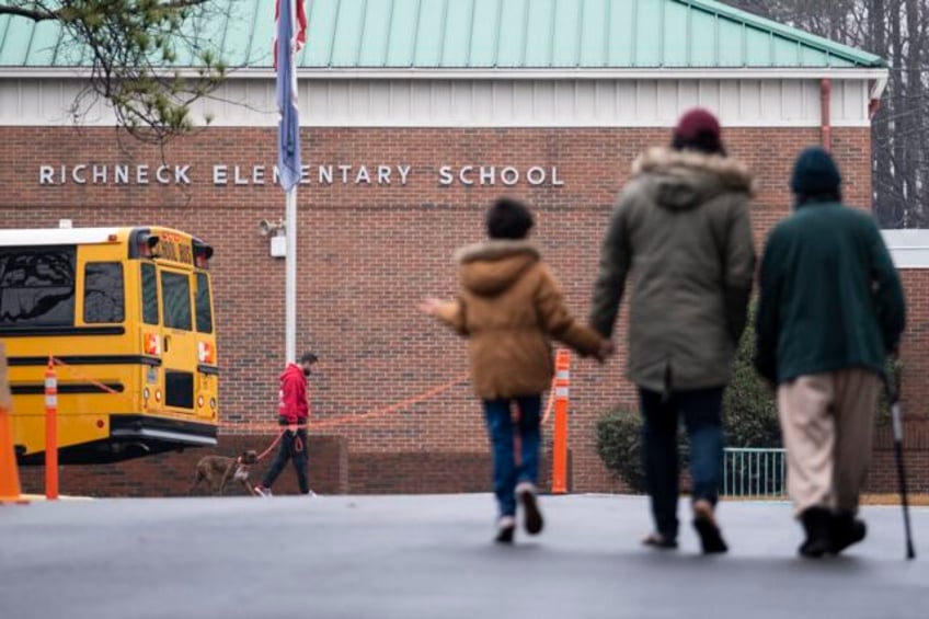 mother pleads guilty to felony child neglect after 6 year old son used her gun to shoot teacher