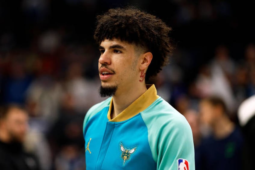 LaMelo Ball of the Charlotte Hornets looks on prior to the start of the game against the Minnesota Timberwolves at Target Center on January 22, 2024...