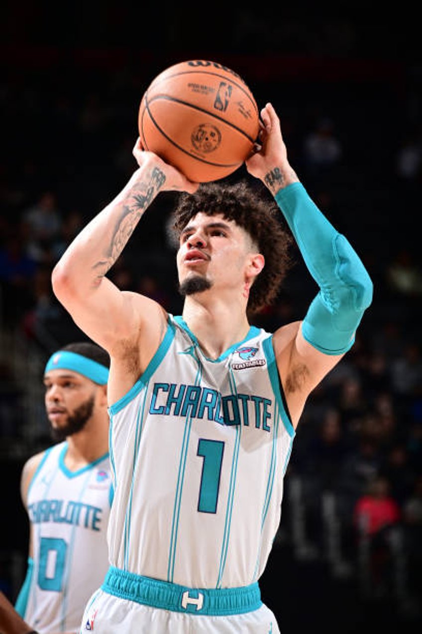 LaMelo Ball of the Charlotte Hornets shoots a free throw during the game against the Detroit Pistons on January 24, 2024 at Little Caesars Arena in...