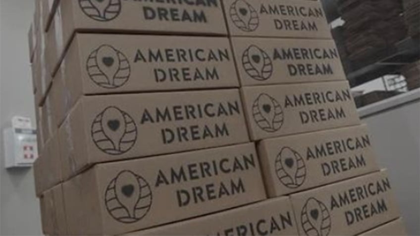 Boxes labeled "American Dream" 