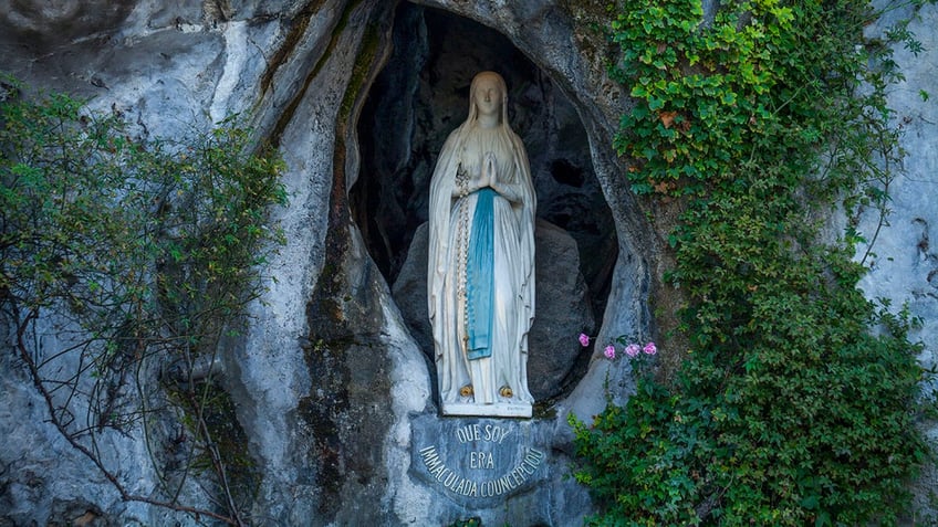 Virgin Mary statue in niche