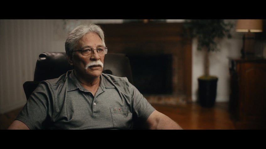 Richard Hanchett in a grey shirt and glasses.