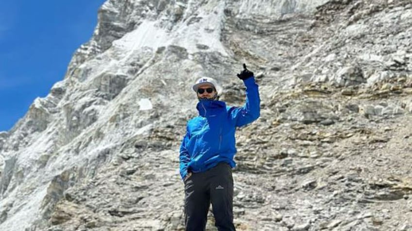 Dan Paterson waiting to climb the summit