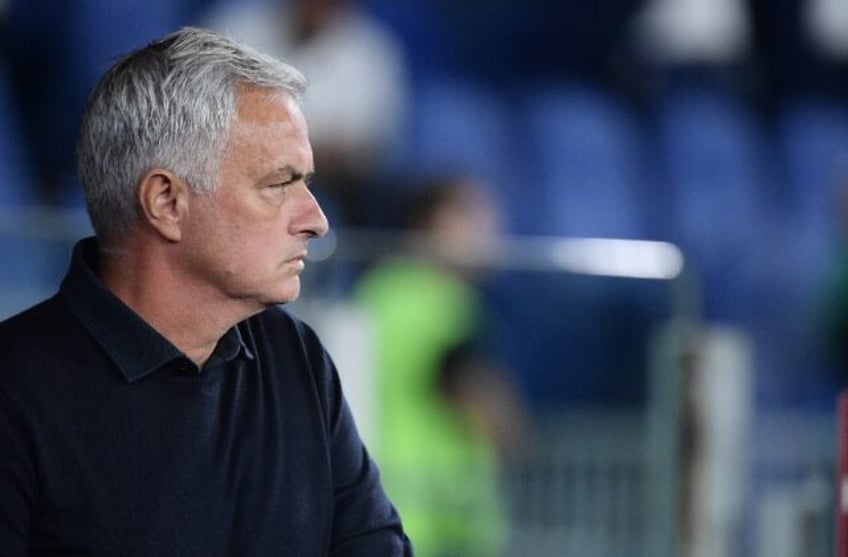 mourinhos roma sink to four goal genoa defeat