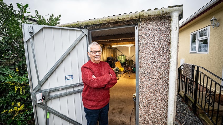 Holbrook in front of shed