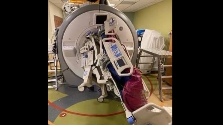 mri machine traps nurse in freak accident