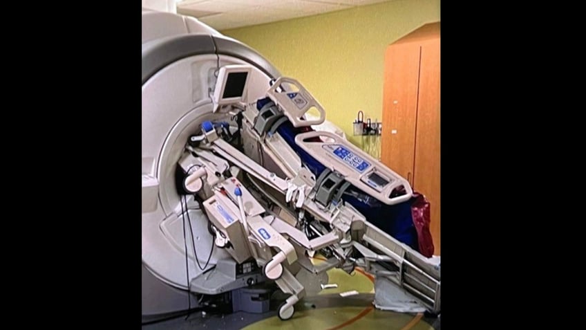 mri machine traps nurse in freak accident