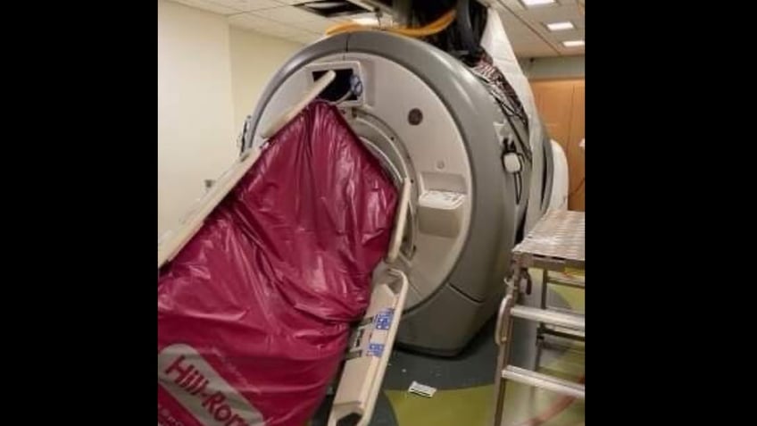 mri machine traps nurse in freak accident