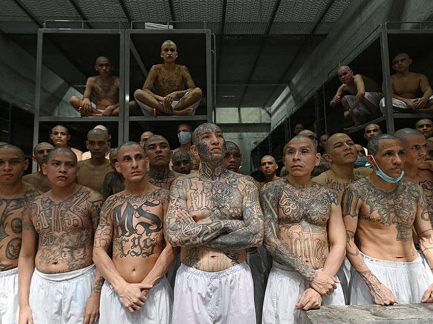 Inmates remain in a cell at the Counter-Terrorism Confinement Centre (CECOT) mega-prison,