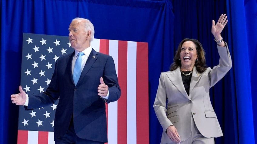 President Joe Biden, left, and Democratic presidential nominee Vice President Kamala Harris arrive to speak about the administration's efforts to lower costs during an event at Prince George's Community College in Largo, Md., Thursday, Aug. 15, 2024. 