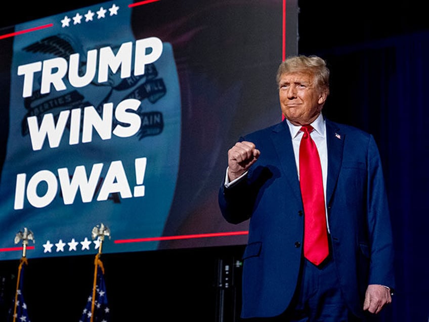 Republican presidential candidate former President Donald Trump takes the stage at a caucus night party in Des Moines, Iowa, Monday, Jan. 15, 2024. (AP Photo/Andrew Harnik)