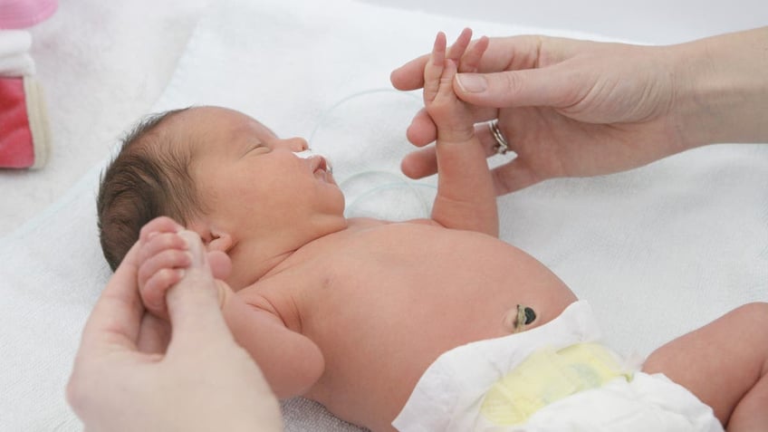 Newborn baby after umbilical cord cut