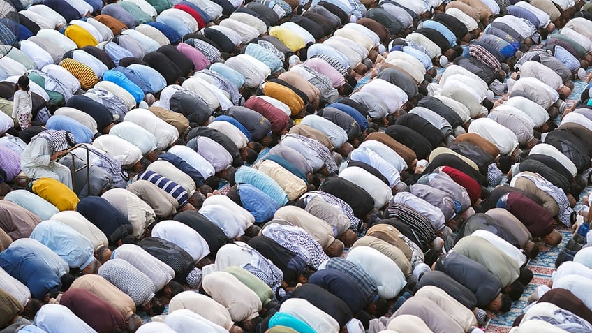 Muslims praying