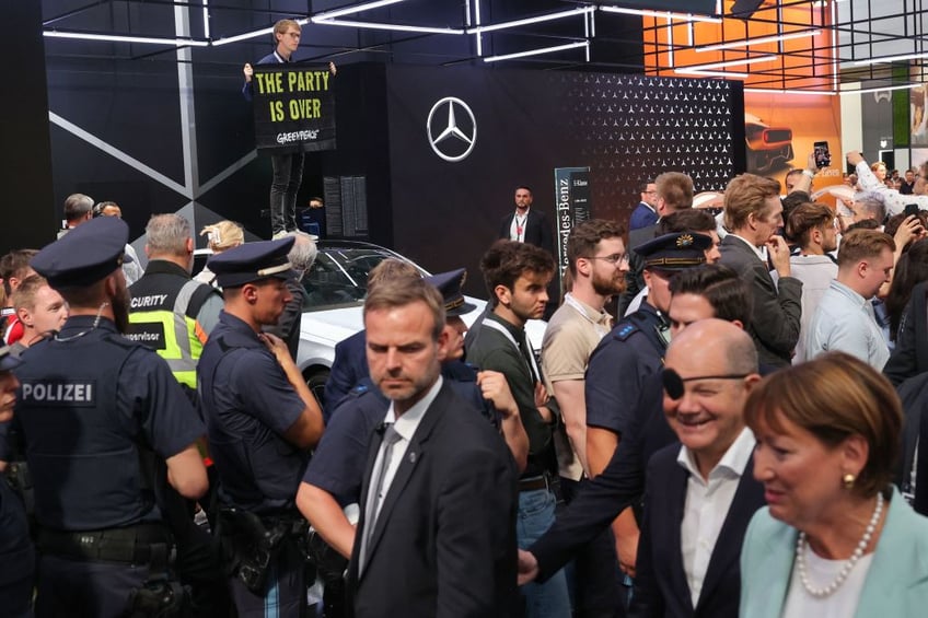 multiple climate protests upstage german chancellor crashing worlds largest motor industry fair