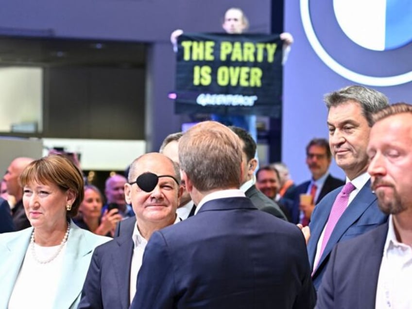 multiple climate protests upstage german chancellor crashing worlds largest motor industry fair