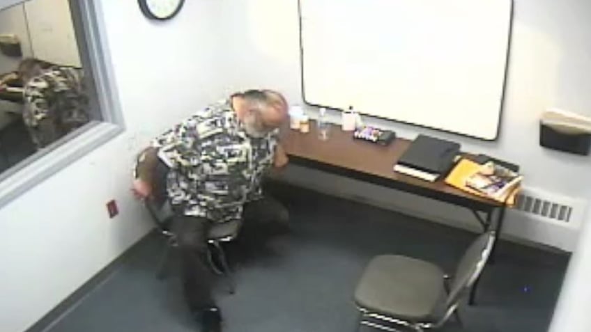 murder suspect left alone in interrogation room lets bodily functions run wild video