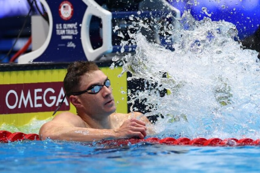 Ryan Murphy smacks the water in satisfaction after winning the 200m backstroke at the US O