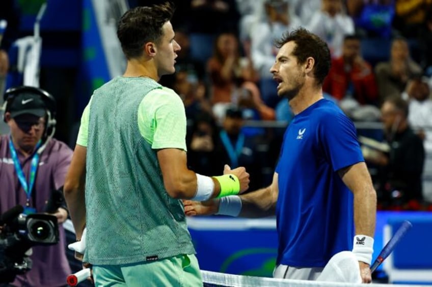 Jakub Mensik (L) won a deciding-set tie-break against Andy Murray (R)